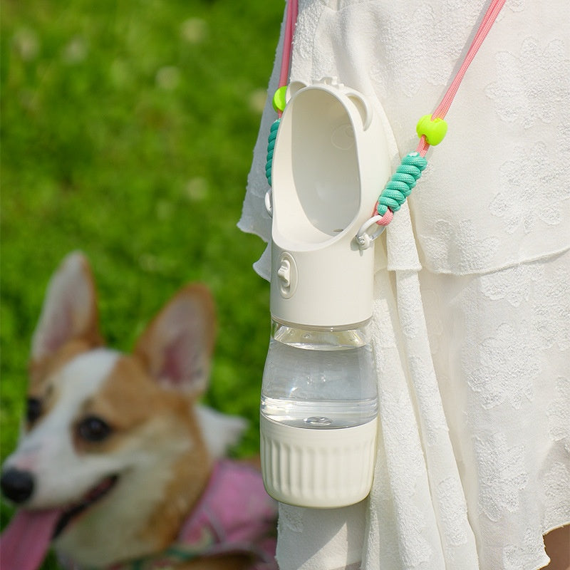 Yellow portable dog water bottle with flip-up drinking bowl