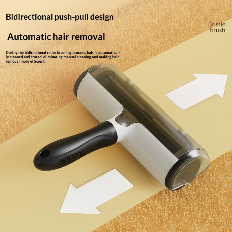 Black reusable pet hair remover roller lifting fur from fabric